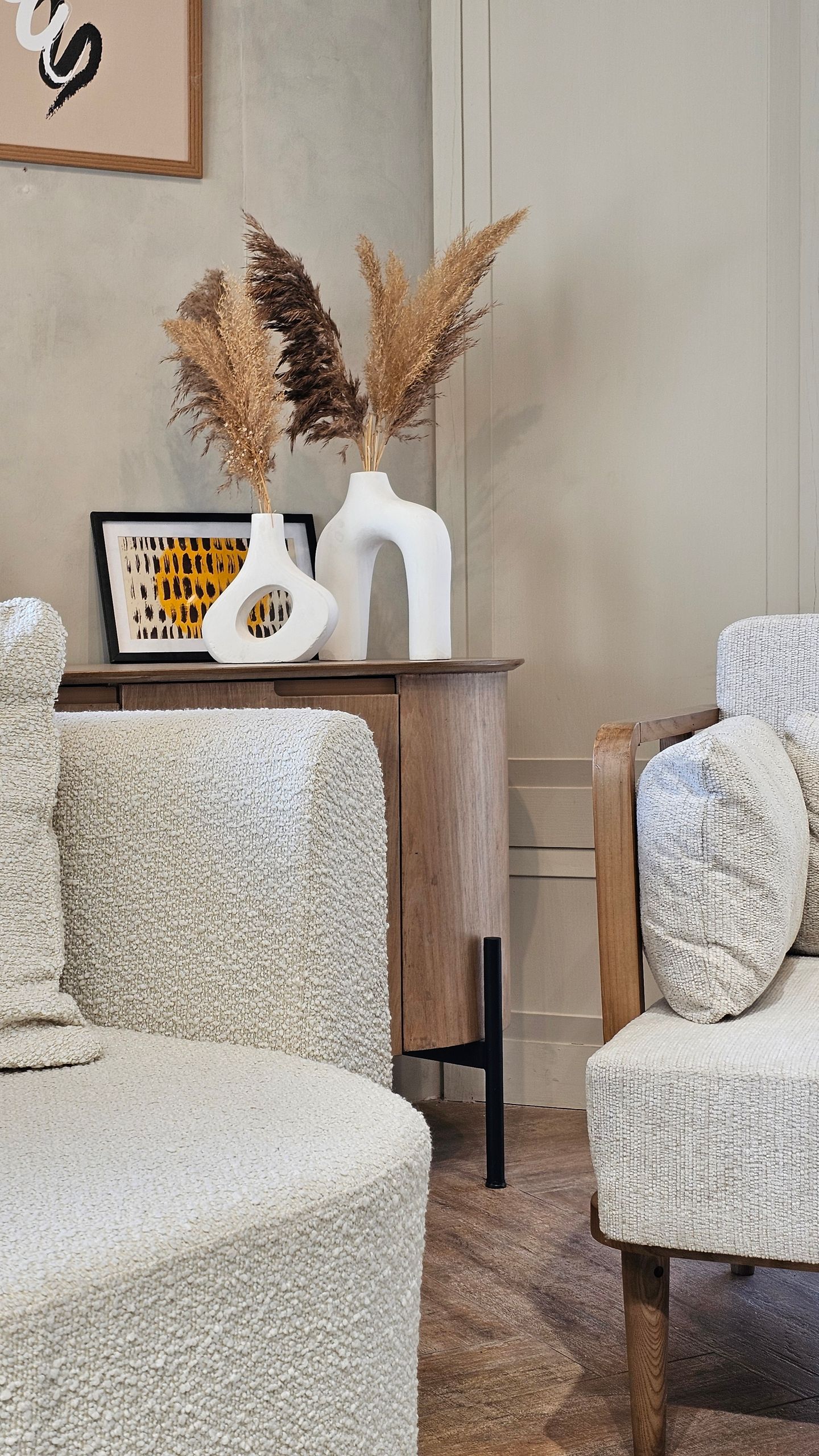 A stylish modern living room with minimalist furniture and decor accents.